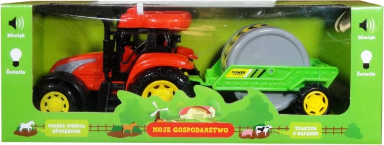 Traktor s prikolico in poljskim zvočnim modulom