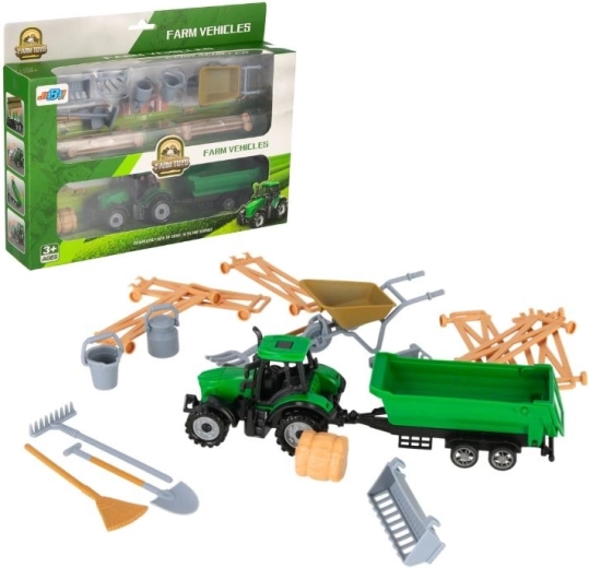 Traktor s prikolico in kmečkimi dodatki