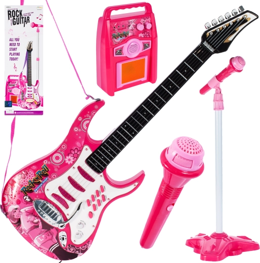 Pink guitar with amplifier and microphone