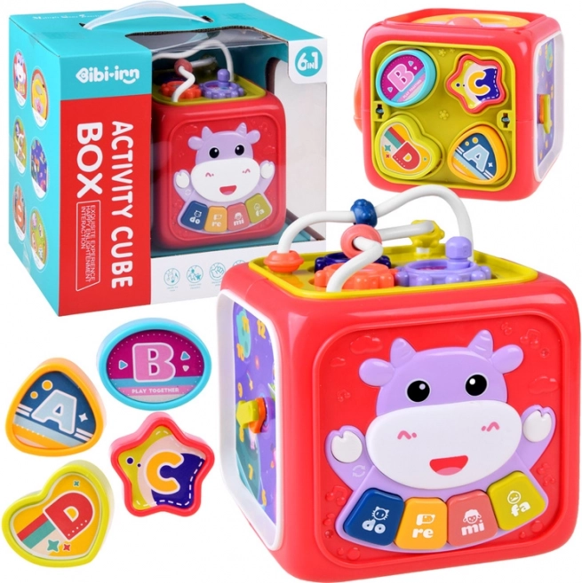 interaktivna izobraževalna kocka s klavirjem, labirintom in sortirnikom