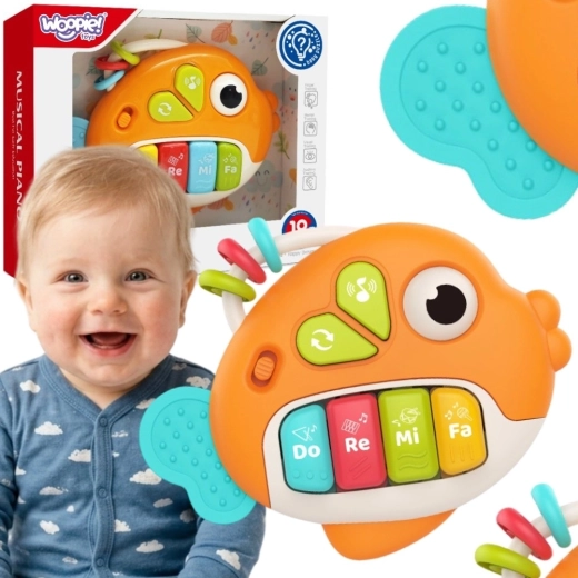 Woopie Baby interaktivna klavirska ribica z zvoki in svetlobo 18m+
