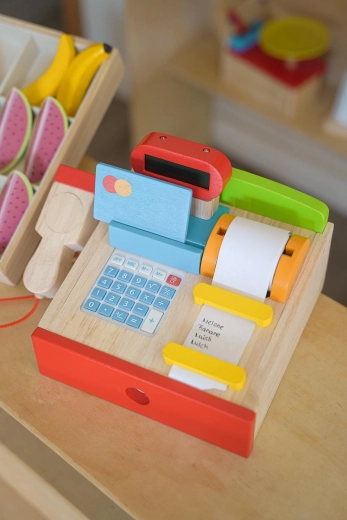 Wooden children’s toy cash register for playing shop with scanner