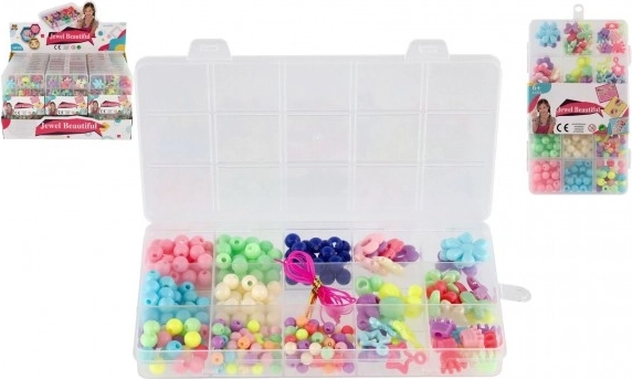 Set barvitih plastičnih perlic z vrvico v priročnem organizatorju