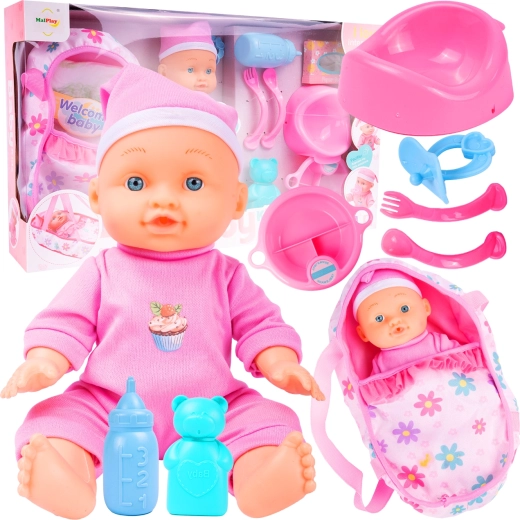 Punčka s pripomočki in nosilko