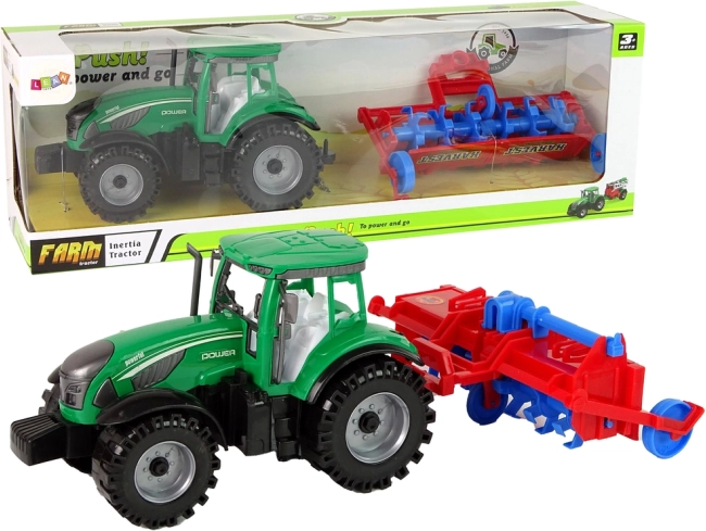 Traktor z plugom s trenjskim pogonom – rdeč