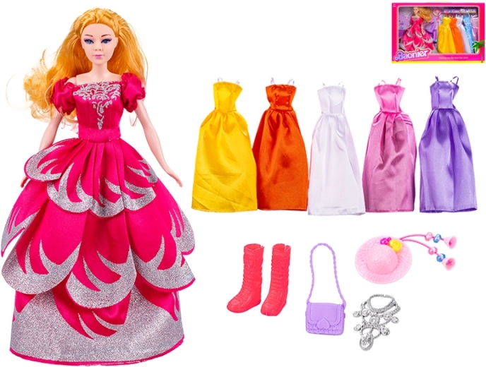 Modna punčka 29 cm z oblekami in dodatki