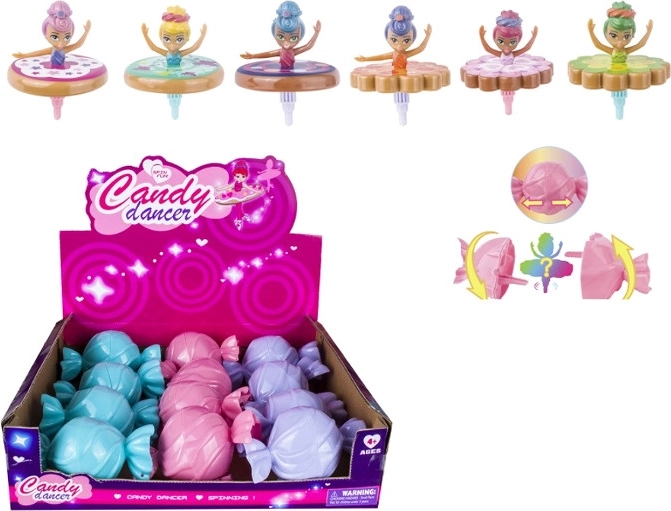 Baletka punčka, ki se vrti kot vrtavka, v darilni embalaži v obliki bonbona