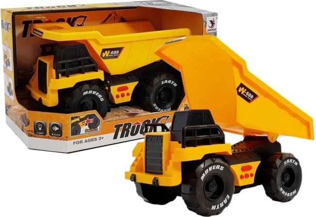 Rumeni otroški tovornjak prekucnik s trenjskim pogonom, lučmi in zvoki