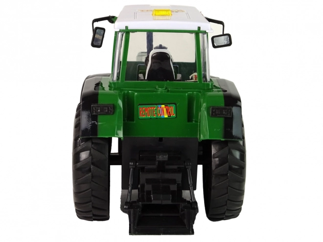 Zeleno-črni R/C traktor na daljinsko upravljanje 38 cm