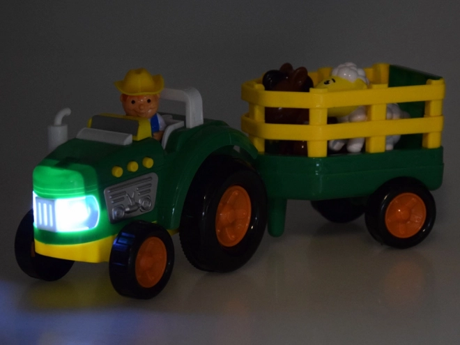 Kmetijski traktor s prikolico in živalmi zvok + svetloba ZA5390
