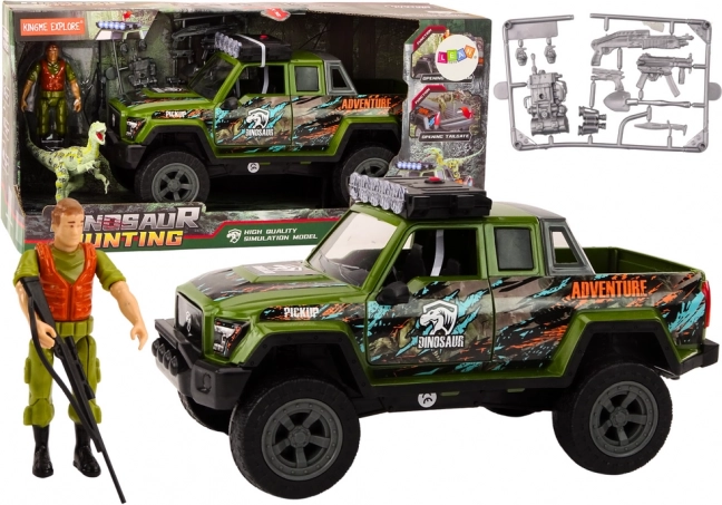 Zeleni terenski avto z dino figuricami in zvočnimi učinki