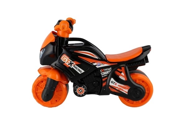 Poganjalec motor oranžno-črno plast v vrečki 35x53x74cm 24m+