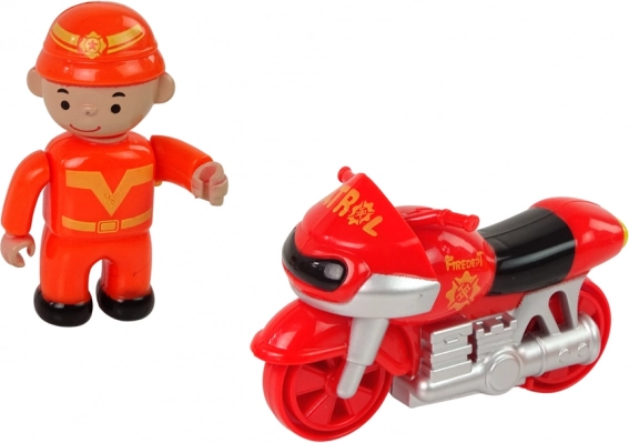 Motorno kolo s figurico gasilca