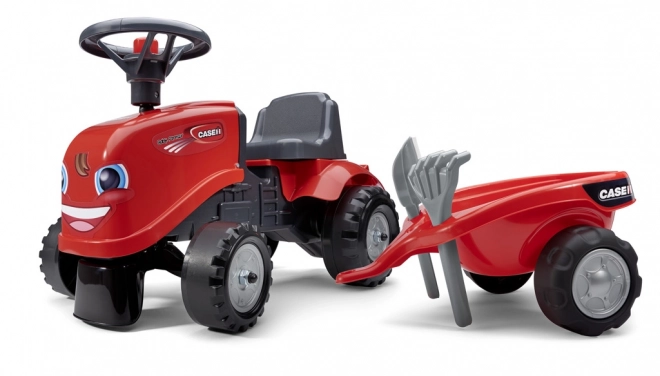 Vozeči traktor Baby Case IH rdeč s prikolico