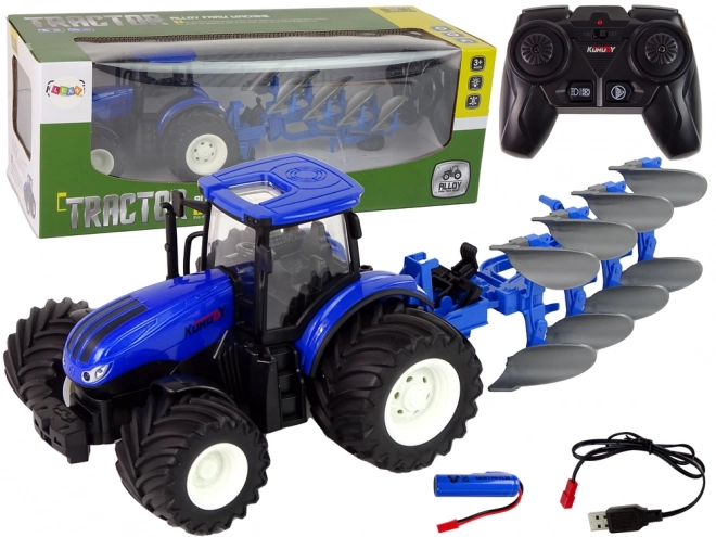 Daljinsko voden traktor 1:24 Modri kovinski plug