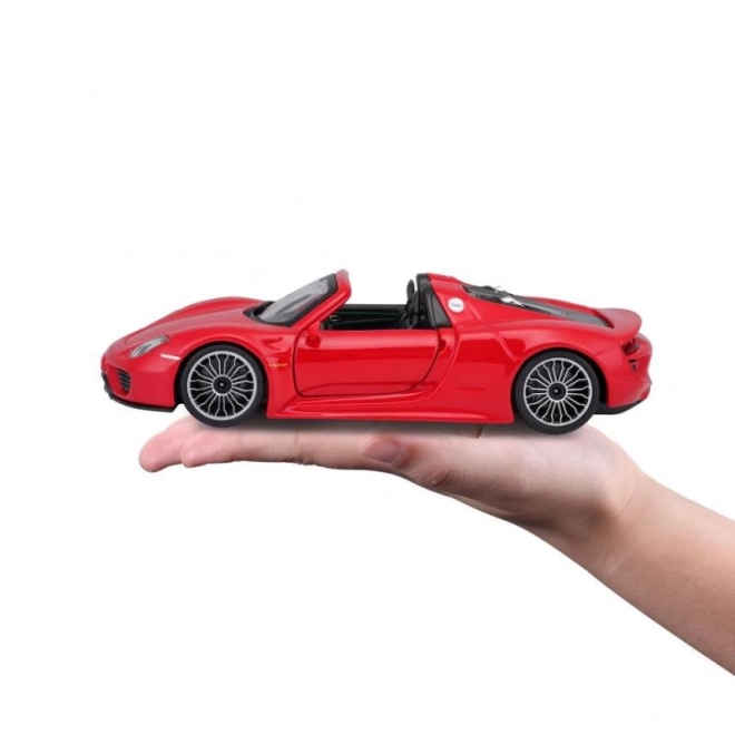 Bburago Porsche 918 Spyder rdeči model 1:24