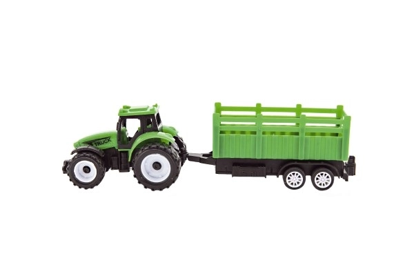 Traktor s prikolico plastika 21cm s prostim tekom, 2 barvi v škatli 23x9x6cm