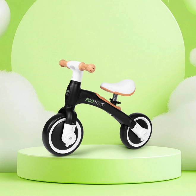 Poganjalec s pedali in pomožnimi kolesci črn ECOTOYS