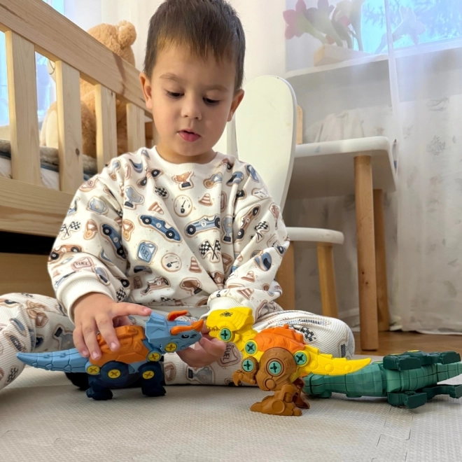 Woopie komplet dinozavri za vijačenje 3 kosi gradbeni komplet s kovčkom in vrtalnikom z izvijačem