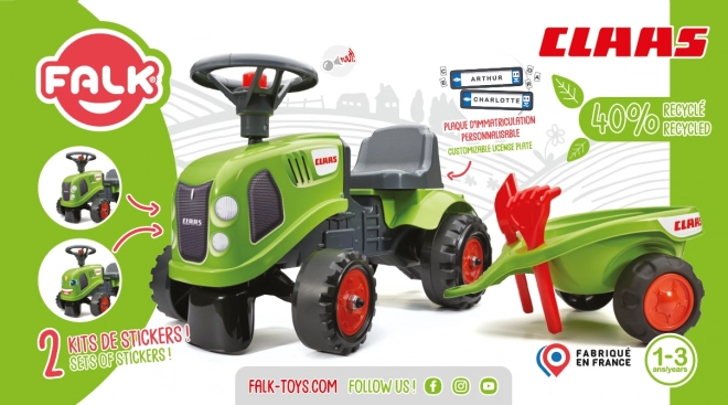Poganjalec traktor Claas zelen z volanom in prikolico