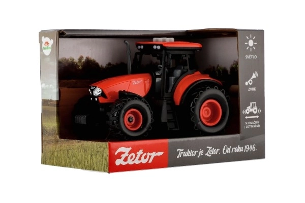 Rdeči traktor Zetor s vztrajnikom z zvočnimi in svetlobnimi učinki