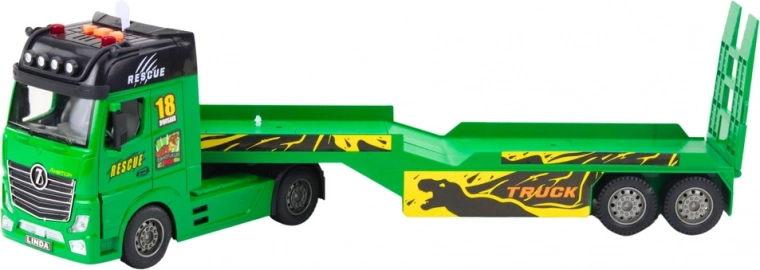 Truck with low-bed trailer for transporting equipment