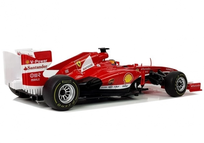 Dirkalni avto Formule 1 Ferrari F138 rdeče 1:12