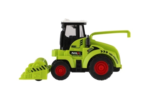 Plastičen kombajn 7x12cm na vztrajnik 2 vrsti