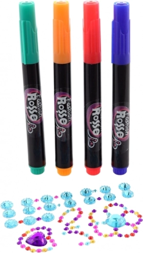 Barvni flomastri in bleščeči kamenčki