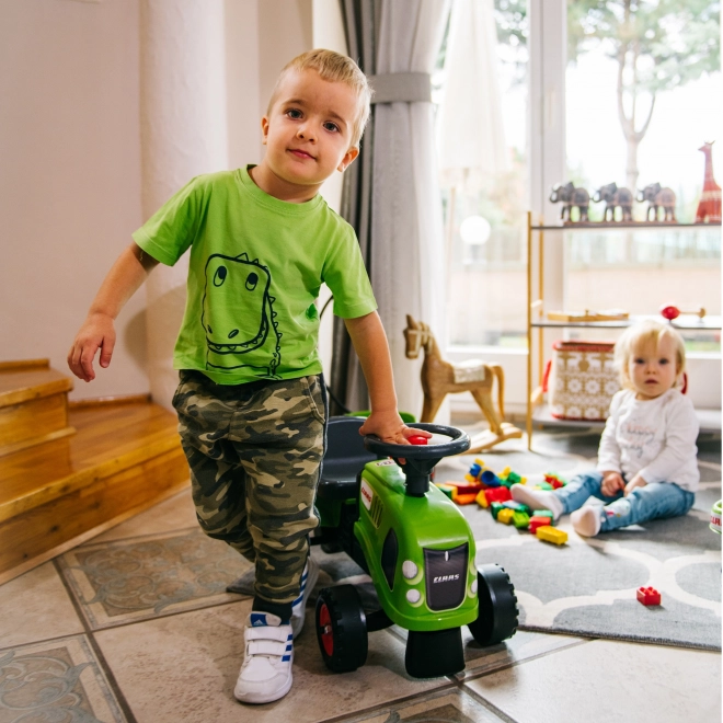 Poganjalec traktor Claas zelen z volanom in prikolico