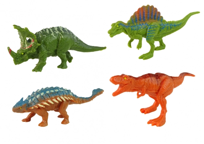 Dinozavrsko vozilo s prikolico in 4 figuricami dinozavrov