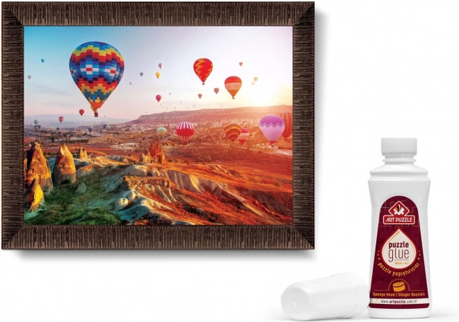 ART PUZZLE Sestavljanka z okvirjem in lepilom 3v1 1000 kosov – Baloni nad Kapadokijo