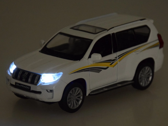 Kovinski model Toyota Land Cruiser Prado z učinki