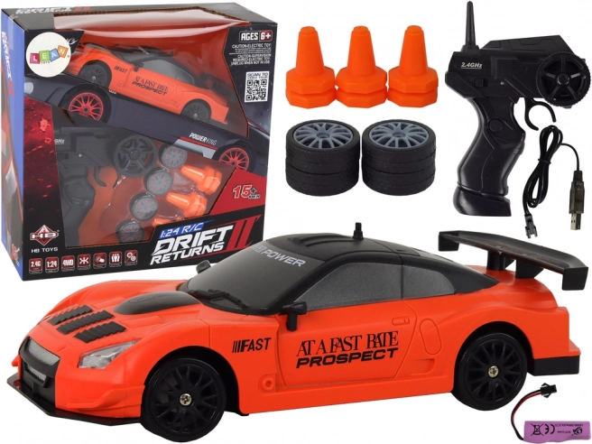 RC športni avto 1:24 oranžen z zamenljivimi kolesi