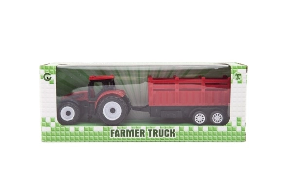Traktor s prikolico plastika 21cm s prostim tekom, 2 barvi v škatli 23x9x6cm