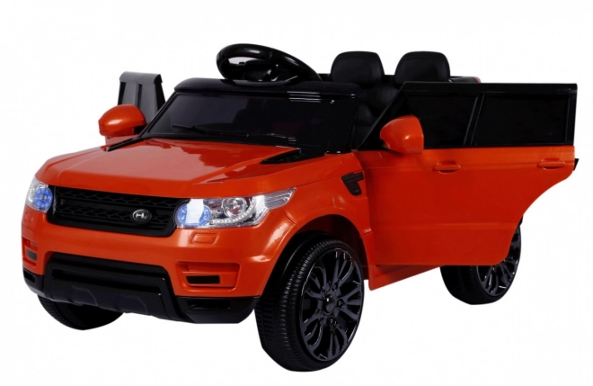 Električni avto Land Rapid Racer oranžen