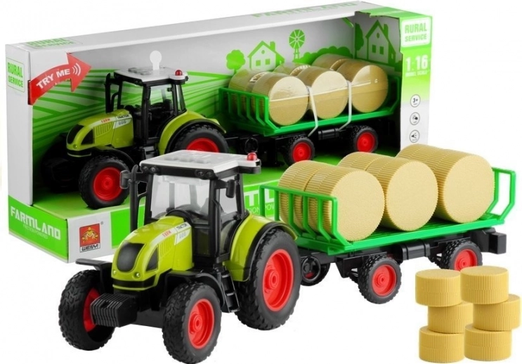 Zeleni traktor s prikolico in balami sena z lučmi in zvoki 37,5 cm