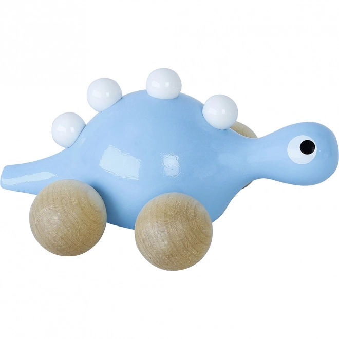 Leseni dinozaver na kolesih Moder