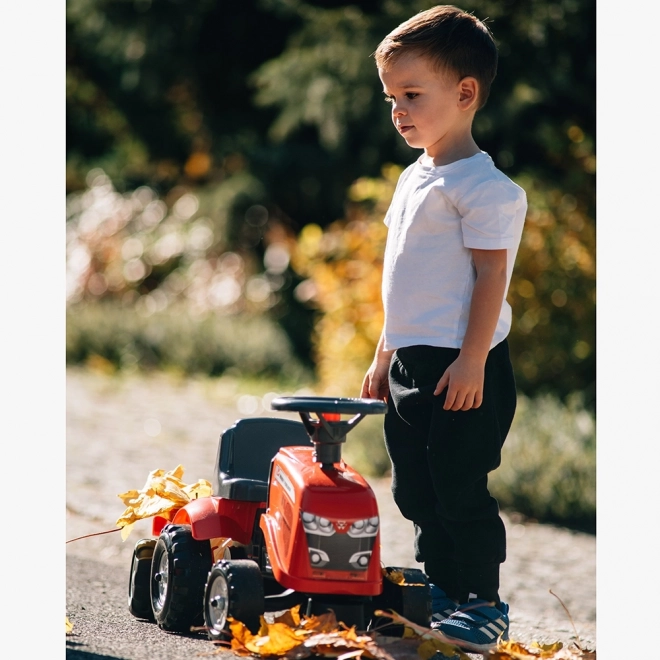 Poganjalec traktor Massey Ferguson rdeč s volanom in prikolico