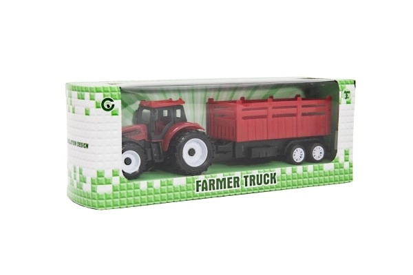 Traktor s prikolico plastika 21cm s prostim tekom, 2 barvi v škatli 23x9x6cm