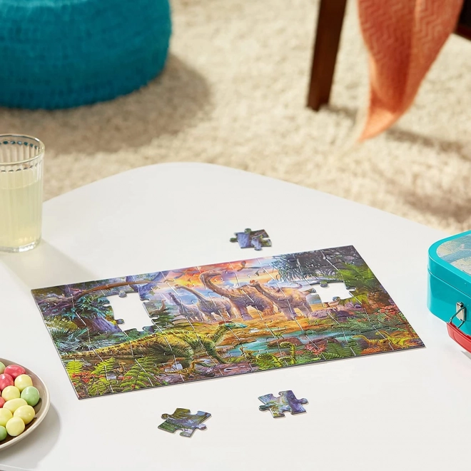 SCHMIDT Puzzle Dinozavri 4v1 v pločevinastem kovčku (60,60,100,100 kosov)