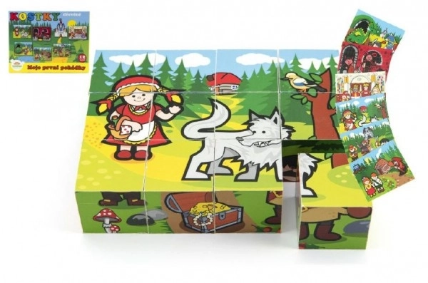 Lesene kocke kubus Moje prve pravljice 12 kos v škatlici 17x12,5x4cm