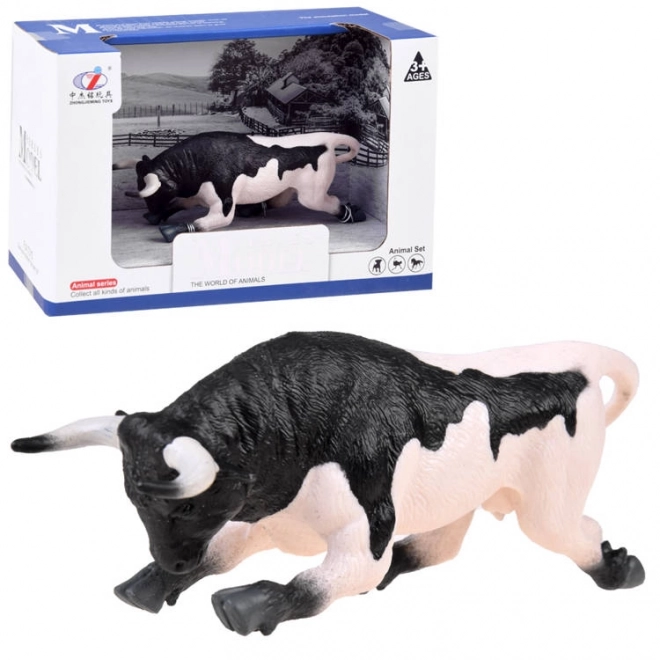 Figura črno-beli bik pripravljen za napad ZA4473