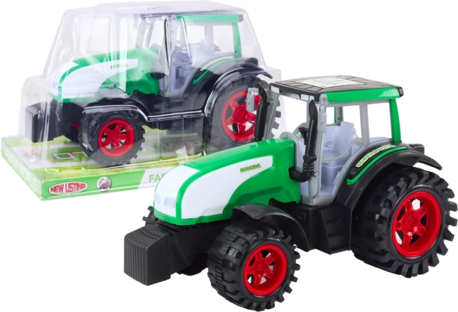 Velik zelen kmečki traktor na vztrajnik