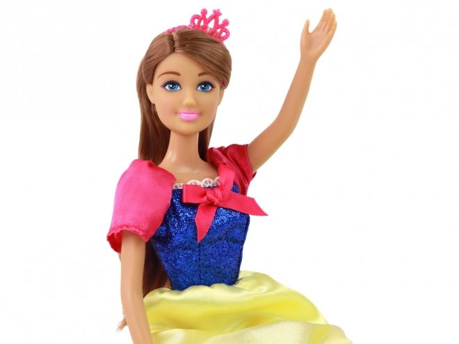 Lutka Anlily Princesa z dolgimi temnimi lasmi in rumeno obleko