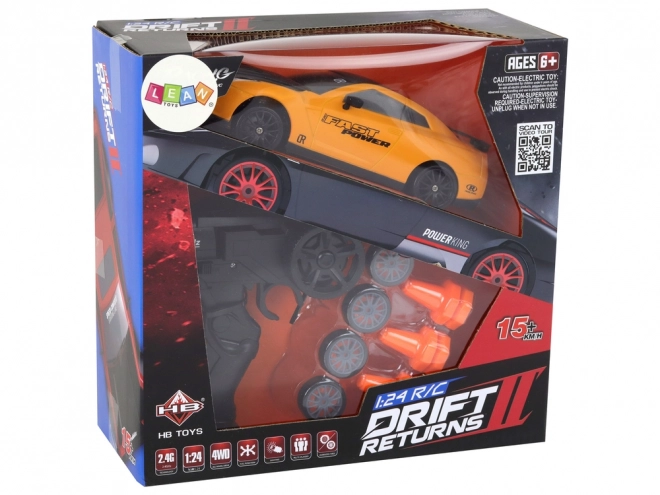 Športni avto R/C 1:24 na daljinsko upravljanje z zamenljivimi kolesi – rumeni