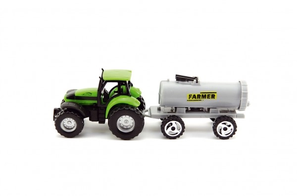 Zeleni traktor s sivim priklopnikom