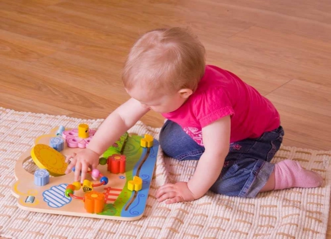 Bigjigs Baby Lesena motorična plošča s cvetovi