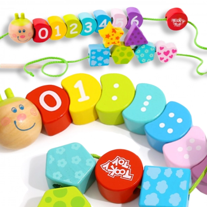Lesena vezalna gosenica TOOKY TOY
