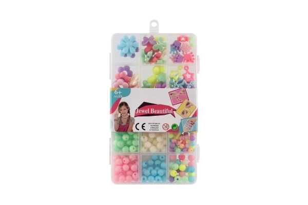Pisani plastični krogci s trakcem v plastični škatlici 10x17x2cm